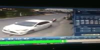Biker tries to pull over but falls head first under the truck