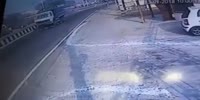 Two motorcyclists are run over and crushed by a gravel truck