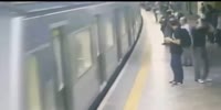Man pushes a girl under the train (better quality)