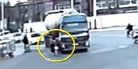 Turning Tanker Squashes Biker