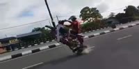 Rider loses a wheel in funny accident