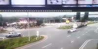 Granny on a scooter runs red light and thrown in the air by a SUV