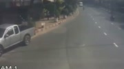 Motorcyclist rammed by a car