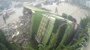 Speeding gravel truck overturns due to broken brakes