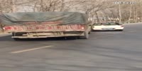 While Inspector fights illegal trucker, his fleeing mate causes an accident