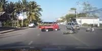Red lorry in the middle of the road causes head on crash