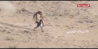 Yemeni rescues his injured colleague and carries him for half a kilo