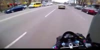 Tough impact of the motorcyclist against the turning car