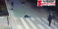Motorcyclists leg sweep a woman and her son on a crosswalk