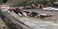 Scum slaps his wife forcing her to lift the scooter