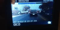 Motorcyclist slides under the truck and gets run over