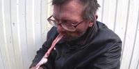 Hobo eats raw testicules