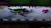 Electric van loses control and crushes a woman against the wall