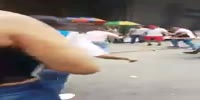 Man is chased and beaten with tubes and helmets