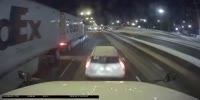 FedEx Trucks hit the car twice