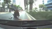 Short vid of a girl on a moped gets rammed by a car