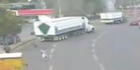 Woman gets run over by 18 wheeler