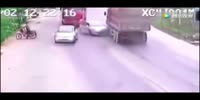 car tackled by cough trucks