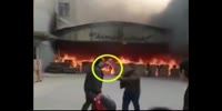woman leaves burning house "walking" (repost)