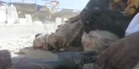 Nusra member films as he dies slowly