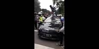 Bunch of riders storm hit and run driver`s car