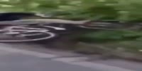 Scumbag on a bike pushes old cyclist into the pit