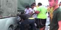 Medics help victims of 2 pick up trucks crash