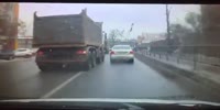 Truck drags a car onto opposite lane and causes the crash