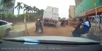 Rider barely avoids being crushed by bricks