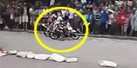 Racing Biker Plows into Spectators