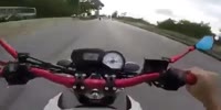 Biker films as he hugs a car