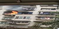 Woman trapped in burning apartment narrowly avoids death