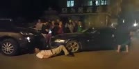 Man gets rammed by car while a road rage argue