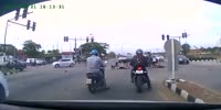 Pick up truck destroys scooter riders at the intersection
