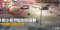 Taxi hits a food delivery bicyclists that ran a red light and into pedestrians