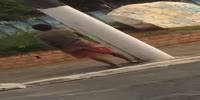 Man argues with a pole
