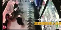 Brick falls on man on the sidewalk killing him
