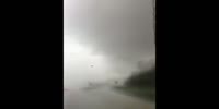 Scared girl films her crash in tornado