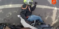 Stupid bikers try to stop a lorry and get in trouble