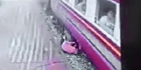 2 Train Passengers Hit the Tracks