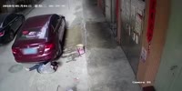 Woman cleaning the street gets run over
