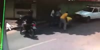Thief gets beaten by protective rider and group