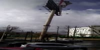 Huge billboard falls crushing 2 cars