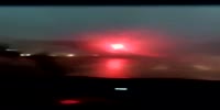 Driver avoids crane falling during heavy rain