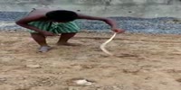 Idiot Annoys The Snake Till It Attacks Him