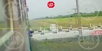 Train destroys a car on the tracks