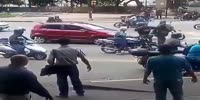 Red car hits Venezuelan cop thugs