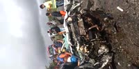 Crash survivor is stuck in what left of his car