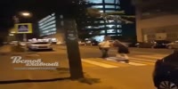 Man is chased and beating for attacking a random woman in the street