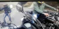 Biker films as he gets robbed of his motorcycle